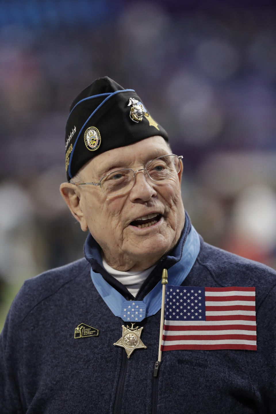 <p>Woody Williams, 94, the only living Marine Medal of Honor recipient from World War II, gets ready to assist with the coin toss. He earned the award for his bravery in the battle of Iwo Jima. (AP Photo/Tony Gutierrez) </p>