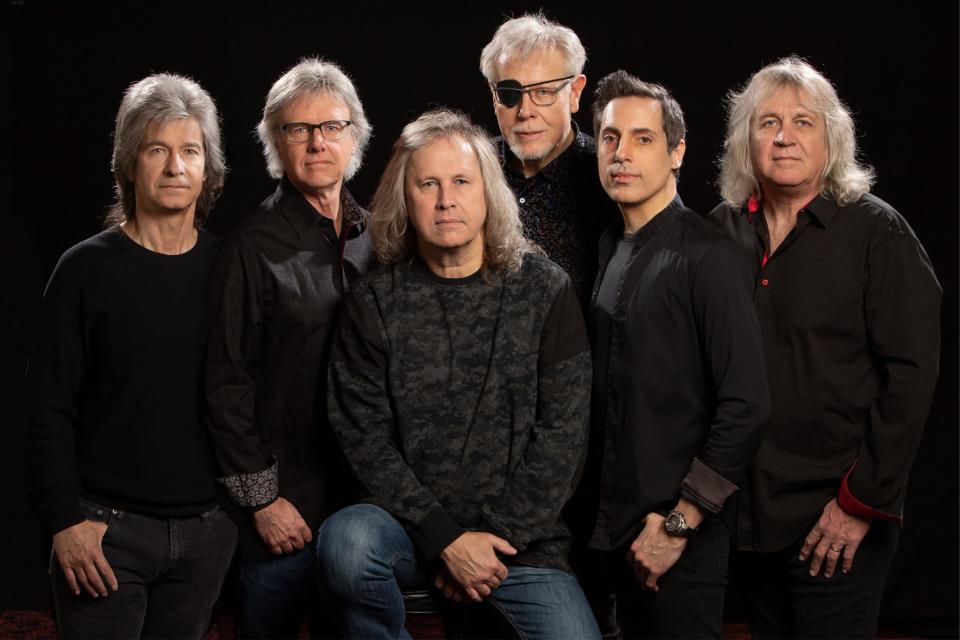 The band Kansas with member Tom Brislin, second from the right.