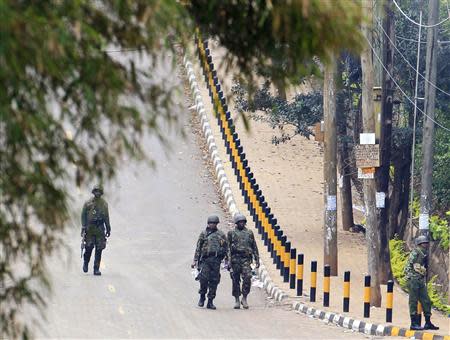 Kenya Defence Forces soldiers patrol the area around Westgate shopping mall in Nairobi September 25, 2013. REUTERS/Noor Khamis