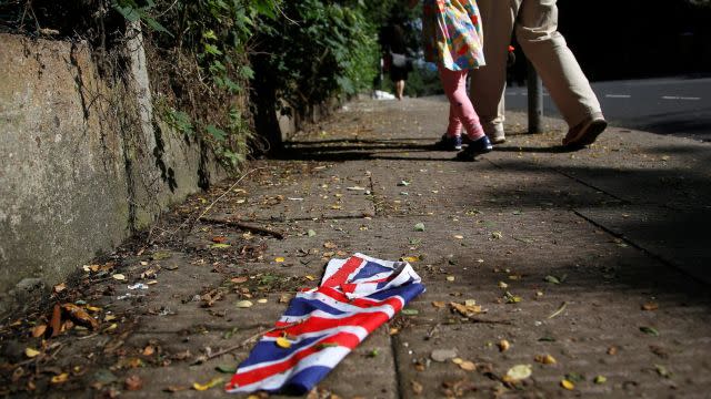 British flag which was washed away by heavy rains the day before lies on the street in London, Britain, June 24, 2016 after Britain voted to leave the European Union in the EU BREXIT referendum.