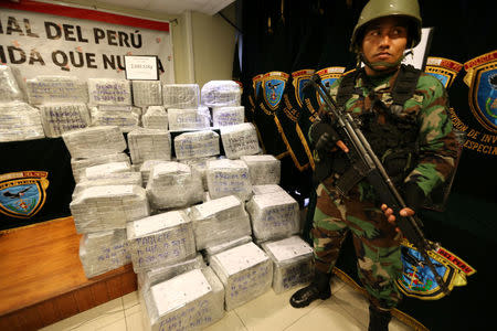 Peruvian police show to the press more than two tons of cocaine hidden in packages of asparagus destined for Amsterdam, and arrested a Serbian man and four Peruvians suspected of running a smuggling operation from a gourmet food business, authorities said, at police headquarters in Lima, Peru, January 12, 2017. REUTERS/Mariana Bazo