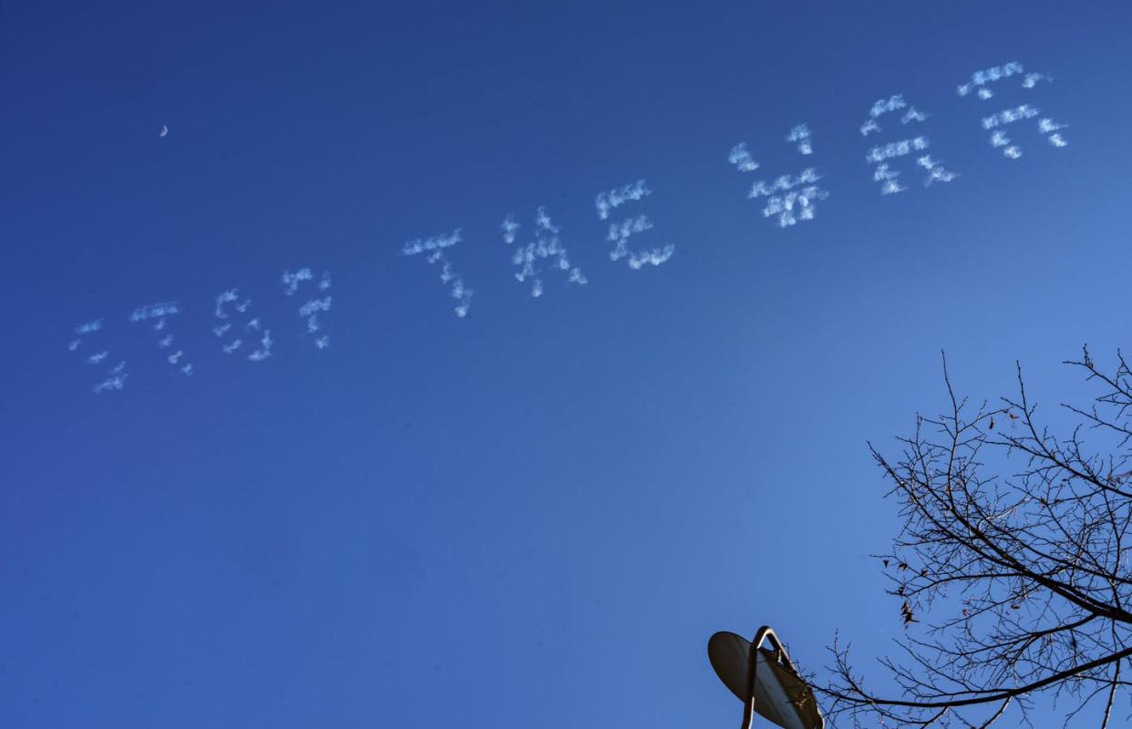 <span class="caption">A team of German pilots wrote "Stop the War" in the sky above Mainz, Germany, on March 9, 2022.</span> <span class="attribution"><a class="link " href="https://media.gettyimages.com/photos/march-2022-rhinelandpalatinate-mainz-stop-the-war-was-written-on-the-picture-id1239050532?s=2048x2048" rel="nofollow noopener" target="_blank" data-ylk="slk:Frank Rumpenhorst/picture alliance via Getty Images;elm:context_link;itc:0;sec:content-canvas">Frank Rumpenhorst/picture alliance via Getty Images</a></span>