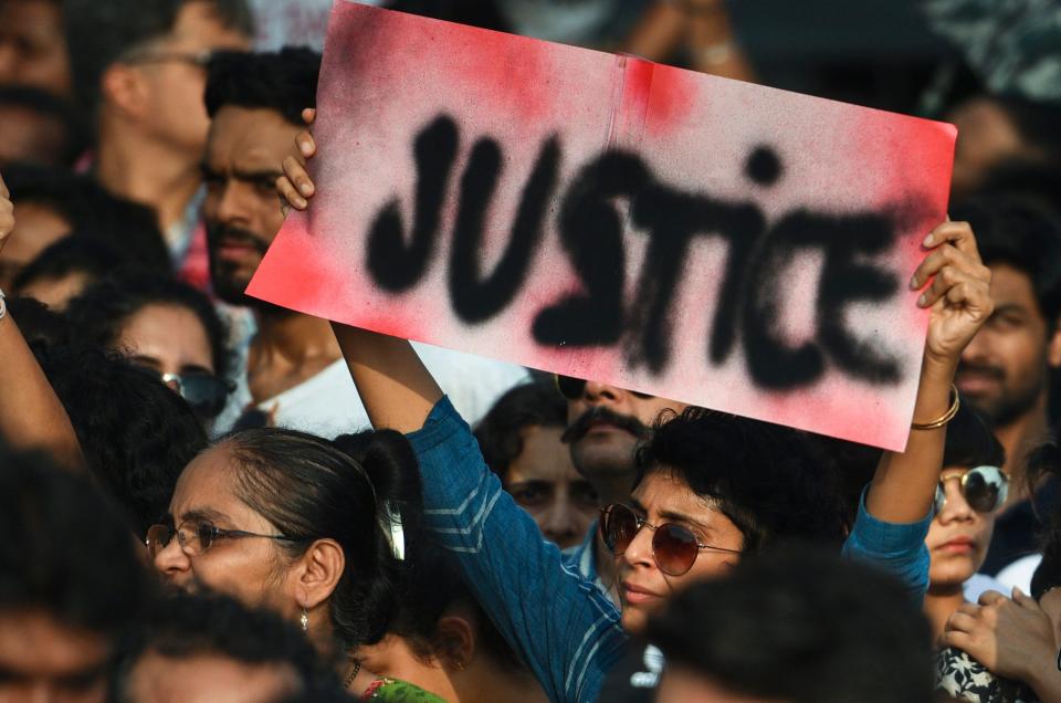 People hold&nbsp;signs as they participate in a protest against the Kathua, Unnao, rape cases and other incidents of rape in India on April 15, 2018 in Mumbai, India.&nbsp; (Photo: Hindustan Times via Getty Images)