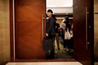 A jobseeker stands as he gets into the 2018 Japan Job Fair in Seoul, South Korea, November 7, 2018. . REUTERS/Kim Hong-Ji/Files