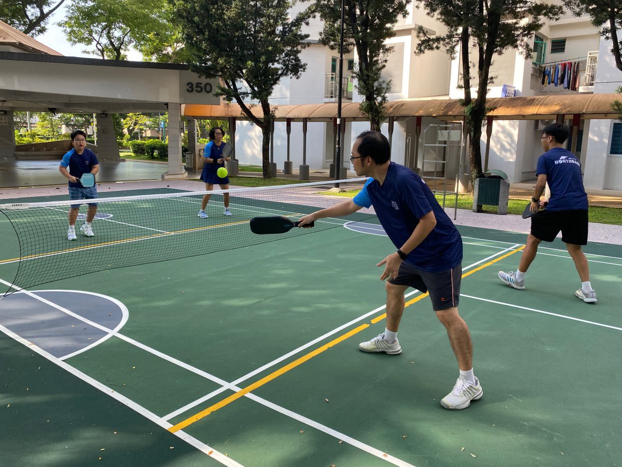 A family in Singapore playing pickleball, a sport which has seen growing popularity in the city-state. (PHOTO: Chia Han Keong/Yahoo News Singapore)