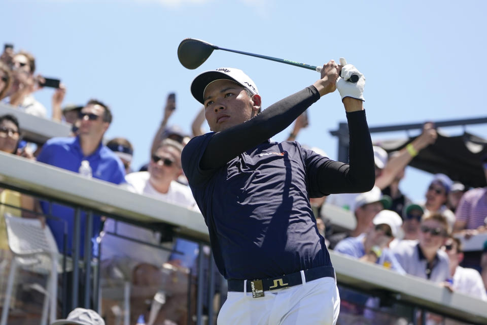 Phachara Khongwatmai, of Thailand, hits off the first tee during the second round of the Bedminster Invitational LIV Golf tournament in Bedminster, N.J., Saturday, July 30, 2022. (AP Photo/Seth Wenig)