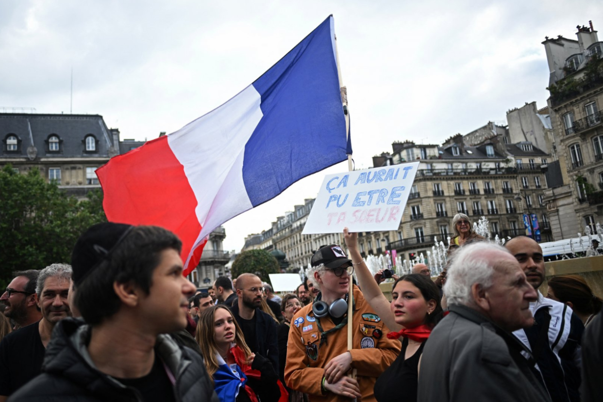 People take part in a demonstration against anti-Semitism in front of Paris City Hall