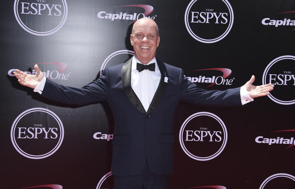 FILE - Scott Hamilton arrives at the ESPY Awards at the Microsoft Theater on Wednesday, July 13, 2016, in Los Angeles. Scott Hamilton can scarcely believe that it has been four decades since he stood atop the Olympic podium in Sarajevo. To commemorate the anniversary of that night at Zetra Olympic Hall, the American figure skating icon is planning to reunite with the rest of the podium — Canadian silver medalist Brian Orser and bronze medalist Josef Sabovcik of Czechoslovakia — for a series of events to raise funds for his foundation and the Memorial Sloan Kettering Cancer Center. (Photo by Jordan Strauss/Invision/AP, File)