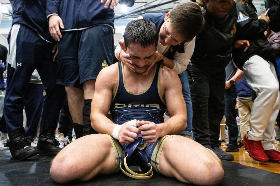 Delaware Military Academy senior Daniel WIlliams gets emotional over his 1st place win over William Penn senior Daniel Sinclair during the 138 pounds championship finals of the DIAA Individual Wrestling State Tournament at Cape Henlopen High in Lewes, Saturday, March 4, 2023.