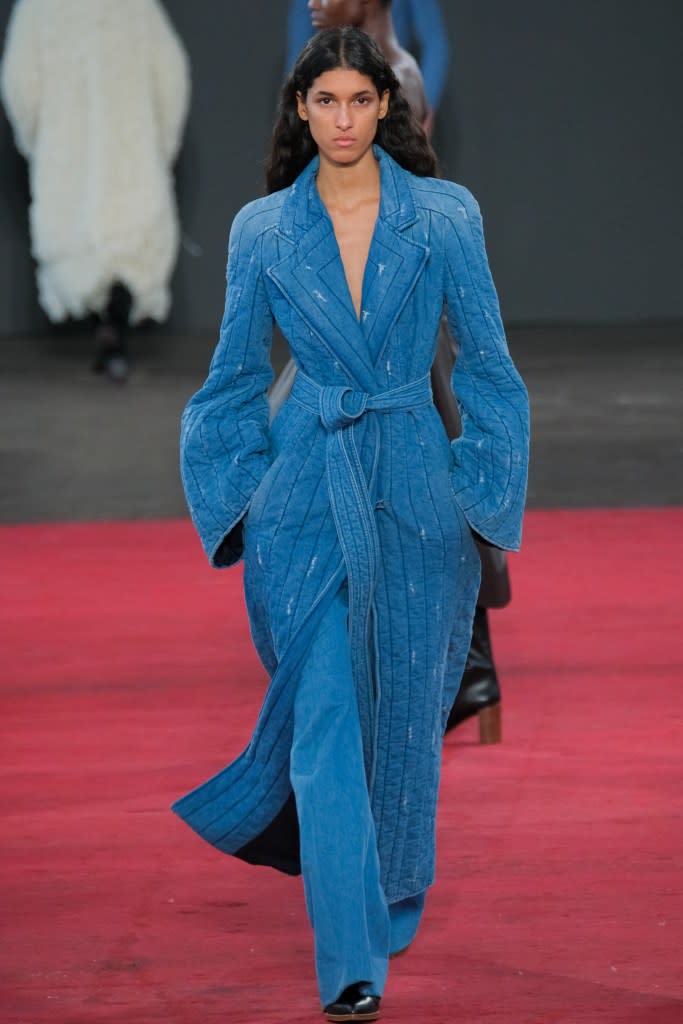 Gabriela Hearst’s classic collection transforms monochrome into an exciting experiment with craft. Look no further than this immaculate denim trench. WWD via Getty Images
