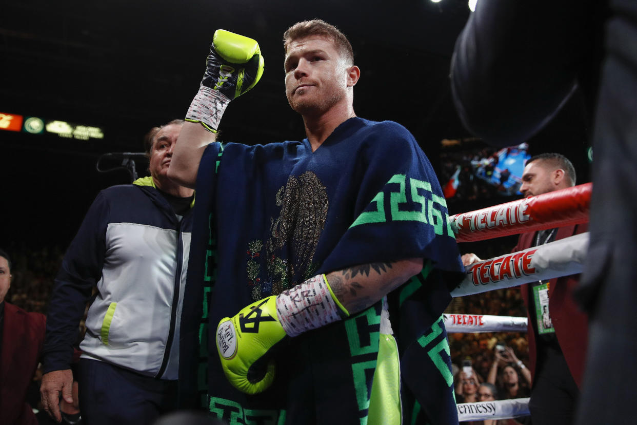 Canelo Alvarez steps into the ring for a fight against Sergey Kovalev, Saturday, Nov. 2, 2019, in Las Vegas (AP Photo/John Locher)