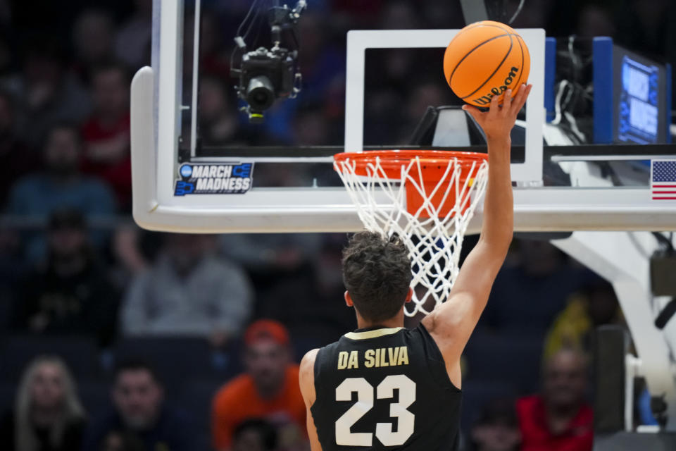 Colorado forward Tristan da Silva (23) shoots during the first half of a First Four game in the NCAA men's college basketball tournament against Boise State, Wednesday, March 20, 2024, in Dayton, Ohio. (AP Photo/Aaron Doster)