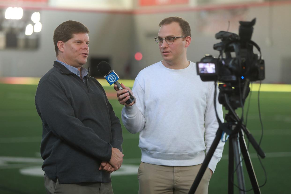 Columbus Dispatch football beat writers Bill Rabinowitz (left) and Joey Kaufman record a podcast prior to an Ohio State bowl game.