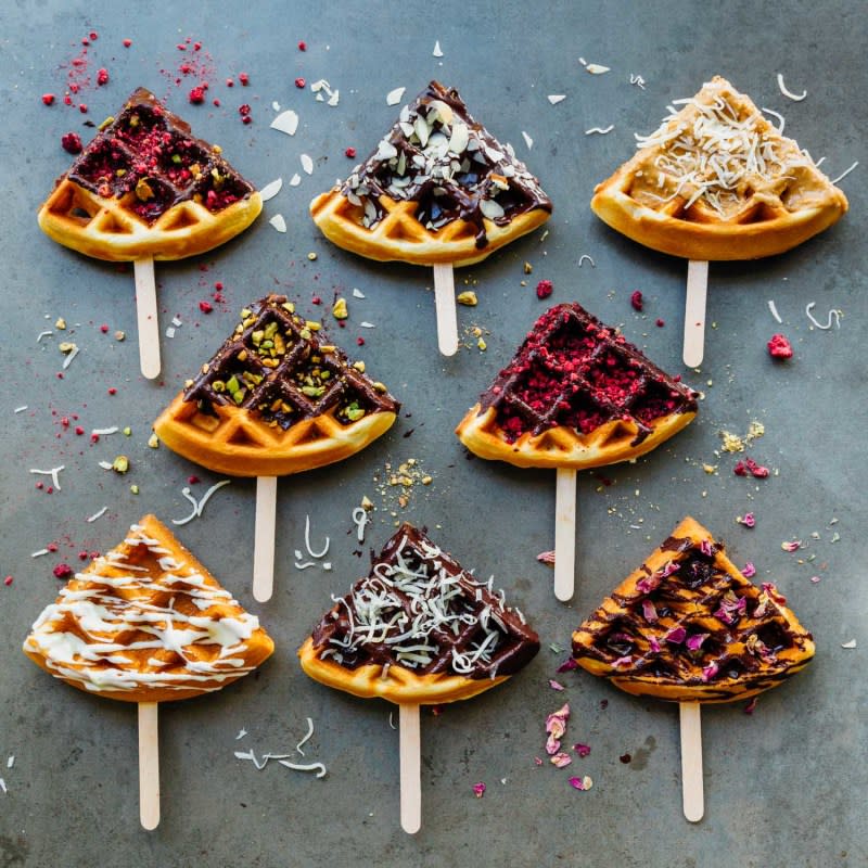 <p>Waffle Pops</p><p>These mini waffles turned into pops will be a delicious treat or just breakfast! Waffle pops could be your next birthday treat or just a great way to enjoy breakfast - covered in delicious toppings like chocolate, coconut, pistachios and peanut butter, you can have a lot of fun taste tasting combinations. </p><p><strong>Get The Recipe: <a href="http://www.madelinelu.com/new-blog/2017/5/4/waffle-pops" rel="nofollow noopener" target="_blank" data-ylk="slk:Waffle Pops;elm:context_link;itc:0;sec:content-canvas" class="link ">Waffle Pops</a></strong></p>