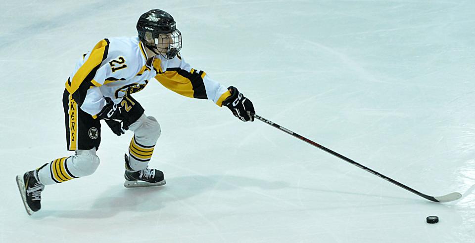 Gabriel Holien of the Watertown Lakers gains control of the puck during a South Dakota Amateur Hockey Association varsity boys game against Aberdeen on Saturday, Feb. 17, 2024 in the Maas Ice Arena. Host Watertown won 3-1.