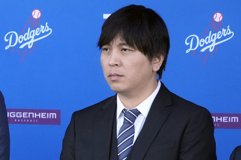 FILE - Interpreter Ippei Mizuhara listens during a baseball news conference at Dodger Stadium, Thursday, Dec. 14, 2023, in Los Angeles. Mizuhara, the former interpreter for Los Angeles Dodgers star Shohei Ohtani pleaded guilty to bank and tax fraud Wednesday, May 8, 2024, in a sports betting case where prosecutors allege he stole $16 million from the Japanese baseball player to pay off debts. (AP Photo/Marcio Jose Sanchez, File)