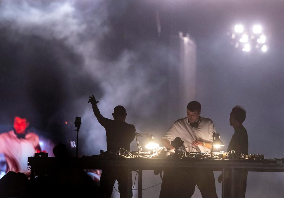 Skrillex (from left), Fred Again and Four Tet perform together at the Coachella stage during the Coachella Valley Music and Arts Festival at the Empire Polo Club in Indio, Calif., Saturday, April 22, 2023. 