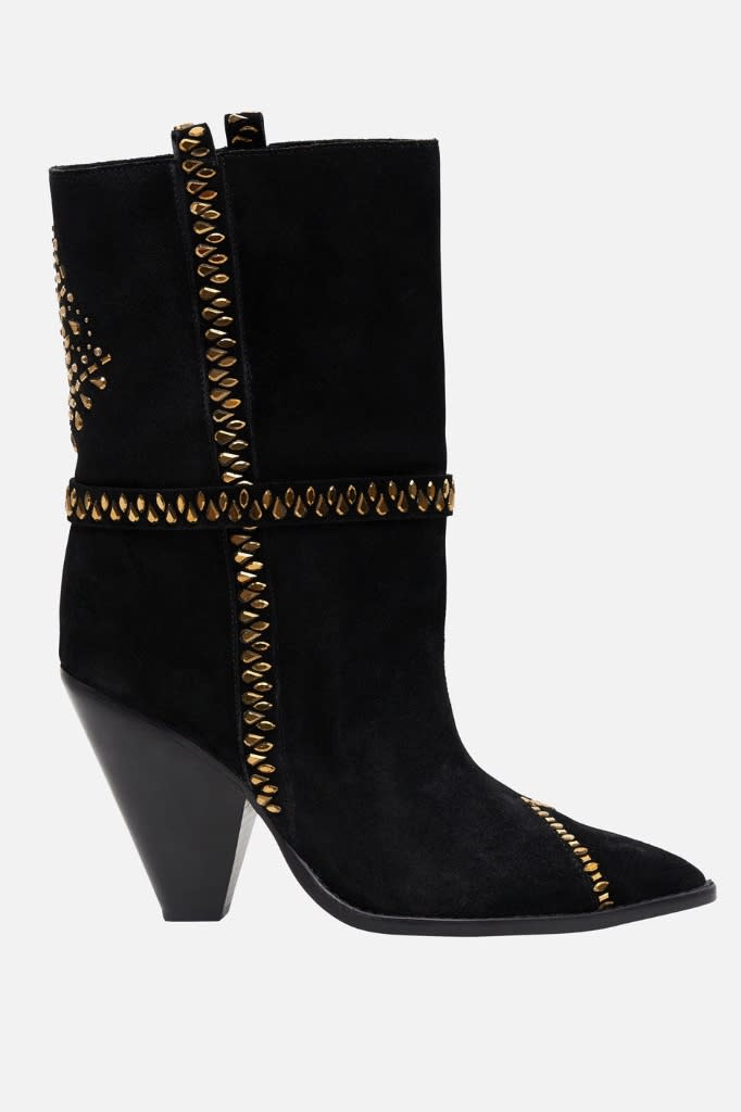 Camilla’s calf-length Western boots. - Credit: Courtesy of Camilla