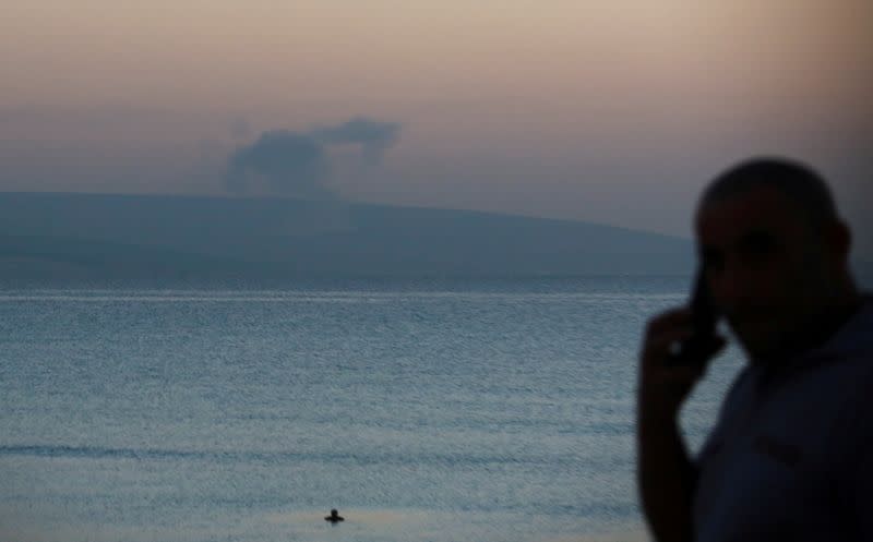 FILE PHOTO: Smoke rises in Lebanon, as seen from Tyre