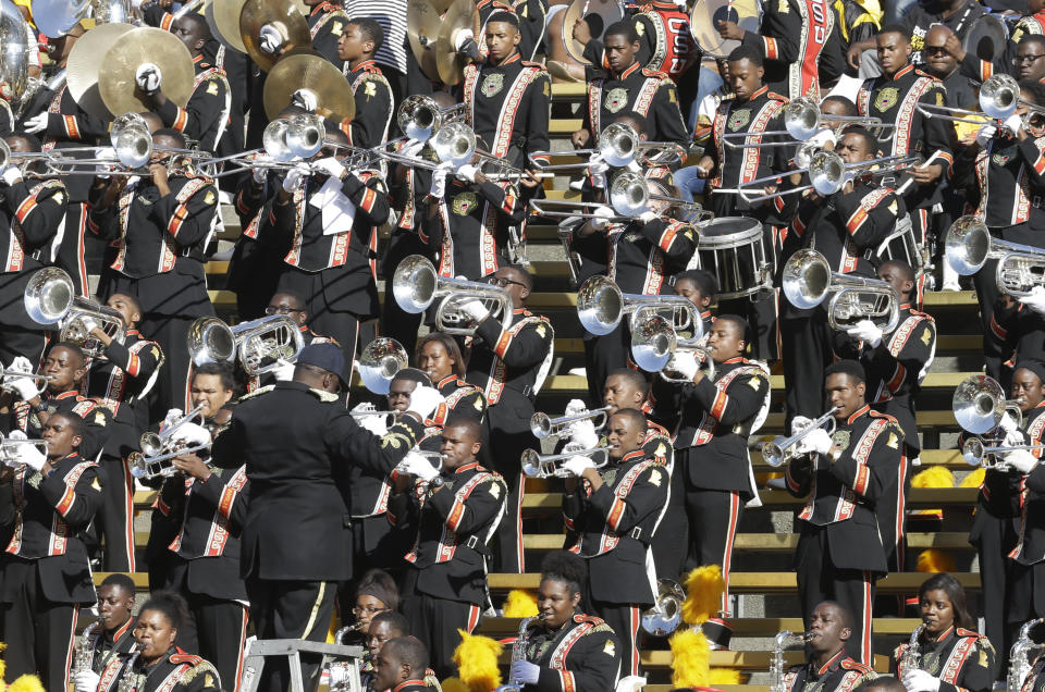 FILE - In this Sept. 5, 2015, file photo, Grambling State's marching band performs during the first half of an NCAA college football game against California in Berkeley, Calif. HBCUs in the Southwestern Athletic Conference have fared well economically so far despite the shutdown of sports because of the new coronavirus. But these programs could take a huge financial hit if fans are banned from football games this fall because of the pandemic. (AP Photo/Ben Margot, File)