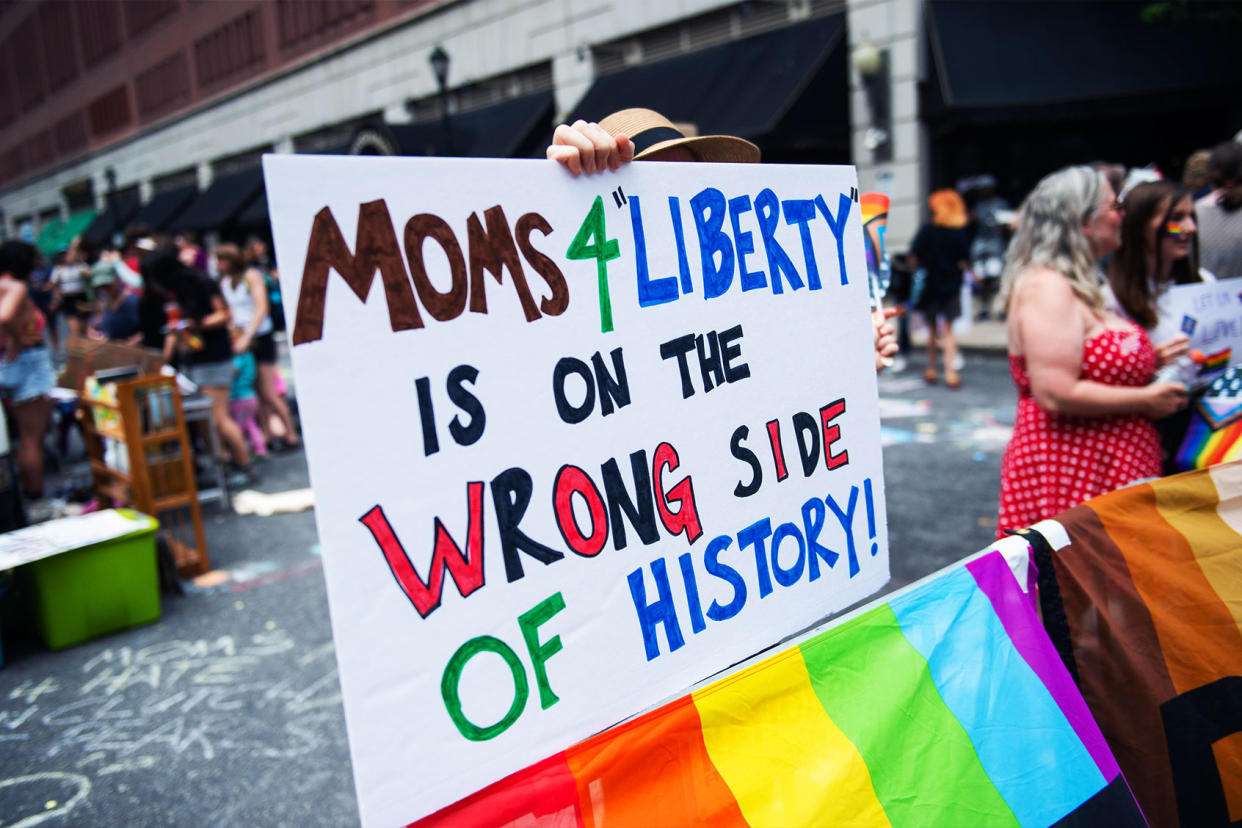 Moms For Liberty Protest Sign Matthew Hatcher/SOPA Images/LightRocket via Getty Images