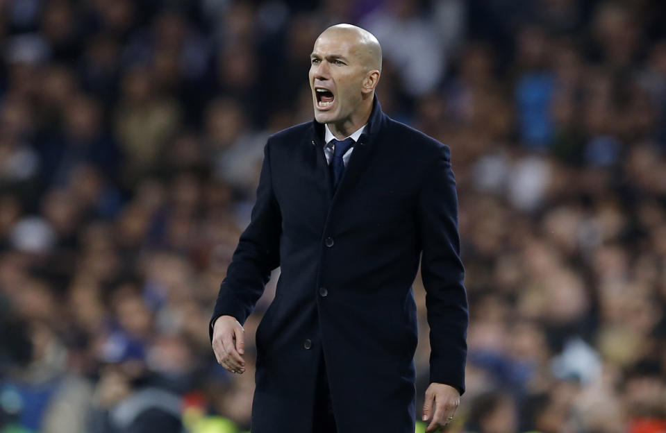 Real Madrid's head coach Zinedine Zidane shouts during the Champions League round of 16, first leg, soccer match between Real Madrid and Napoli at the Santiago Bernabeu stadium in Madrid, Wednesday Feb. 15, 2017. (AP Photo/Francisco Seco)