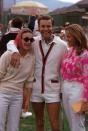 <p>Robert Wagner watches tennis in Palm Springs with two female friends in 1970. </p>