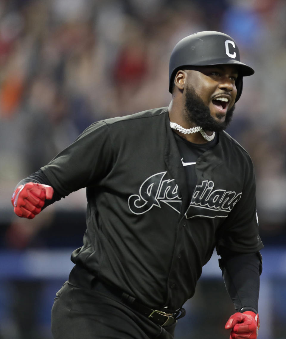 Cleveland Indians' Franmil Reyes celebrates after hitting a three-run home run during the third inning of the team's baseball game against the Kansas City Royals, Saturday, Aug. 24, 2019, in Cleveland. (AP Photo/Tony Dejak)