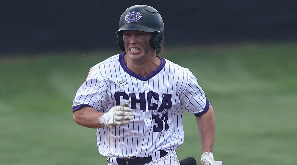 CHCA's  Johnathan Russell (32) runs the bases during their baseball game against Cincinnati Country Day  Tuesday, April 12, 2022.