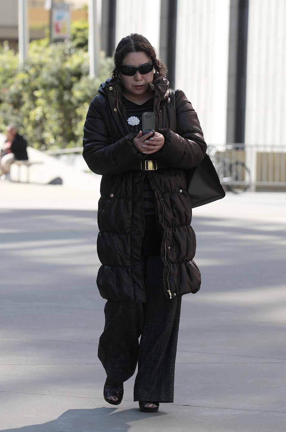 Christina Liew walks out of a federal courthouse in San Francisco, Thursday, March 8, 2012. Liew, who is accused of helping her husband Walter Liew steal trade secrets from DuPont and selling them to a company owned by the Chinese government, pleaded not guilty to economic espionage charges in San Francisco federal court Thursday. (AP Photo/Jeff Chiu)