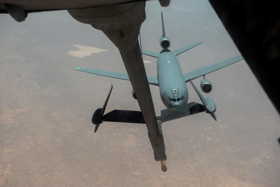 A 908th Expeditionary Air Refueling Squadron KC-10 Extender based out of Al Dhafra Air Base in Abu Dhabi, United Arab Emirates, receives fuel from another KC-10 in an undisclosed location in the Gulf, in this picture released by U.S. Air Force on August 6, 2019.