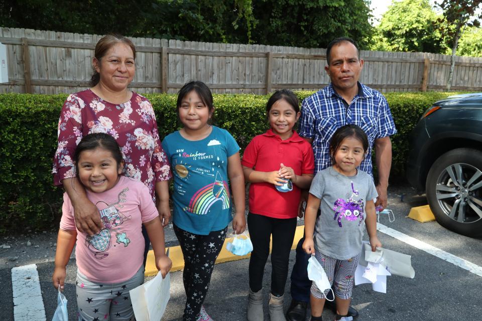 Jesus Hernandez and his wife, Julia, both farmworkers in the Plant City area, with their daughters Zaira, 4, Yaretzi, 7, Yareli, 7, and Yulisa, 5. The couple struggled to help their older girls with worksheets sent home when school closed because neither speaks English and homework instructions were in English and their girls don’t yet read.