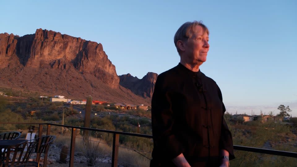 Geri Roll, the former election director in Pinal County, at the foot of the Superstition Mountains. She says conspiracy theories about elections are “nonsensical.”<br /><br /> - CNN
