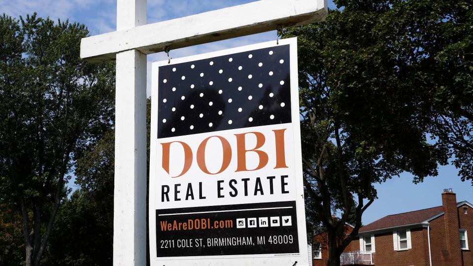 DOBI Real Estate yard sign.