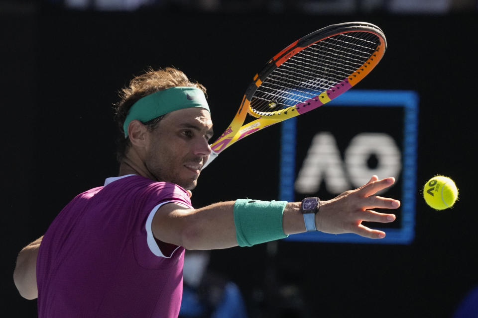 Rafael Nadal of Spain celebrates his win over Adrian Mannarino of France in their fourth round match at the Australian Open tennis championships in Melbourne, Australia, Sunday, Jan. 23, 2022. (AP Photo/Simon Baker)