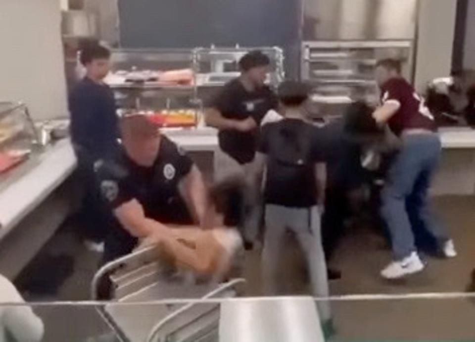 Footage captures officer hurling student onto lunch cart (Facebook)