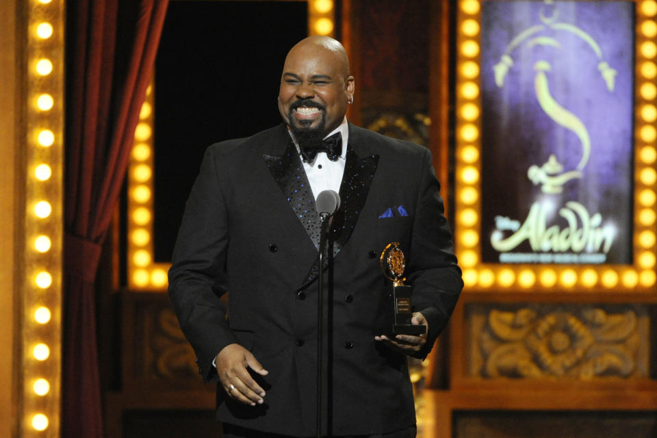 FILE - James Monroe Iglehart accepts the award for best performance by an actor in a featured role in a musical for "Aladdin" on stage at the 68th annual Tony Awards at Radio City Music Hall on Sunday, June 8, 2014, in New York. (Photo by Evan Agostini/Invision/AP, File)