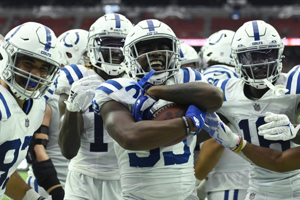 Indianapolis Colts running back Deon Jackson (35) celebrates with teammates after a touchdown run against the Houston Texans during the second half of an NFL football game, Sunday, Dec. 5, 2021, in Houston. (AP Photo/Justin Rex )