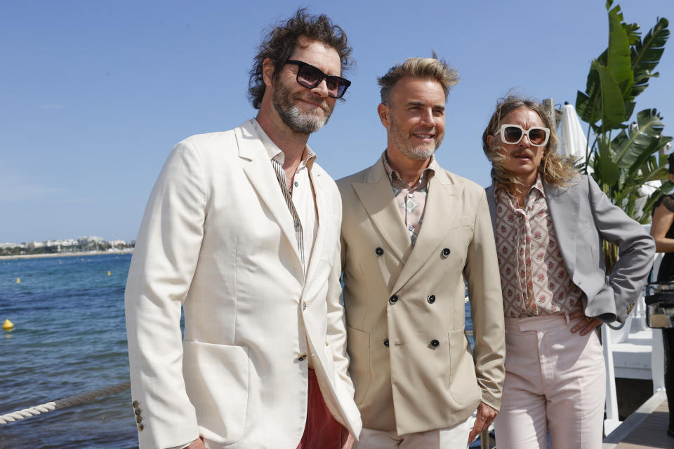 Take That members Howard Donald, Gary Barlow and Mark Owen have been very supportive of Greatest Days, and even make a cameo in the film (Getty Images)