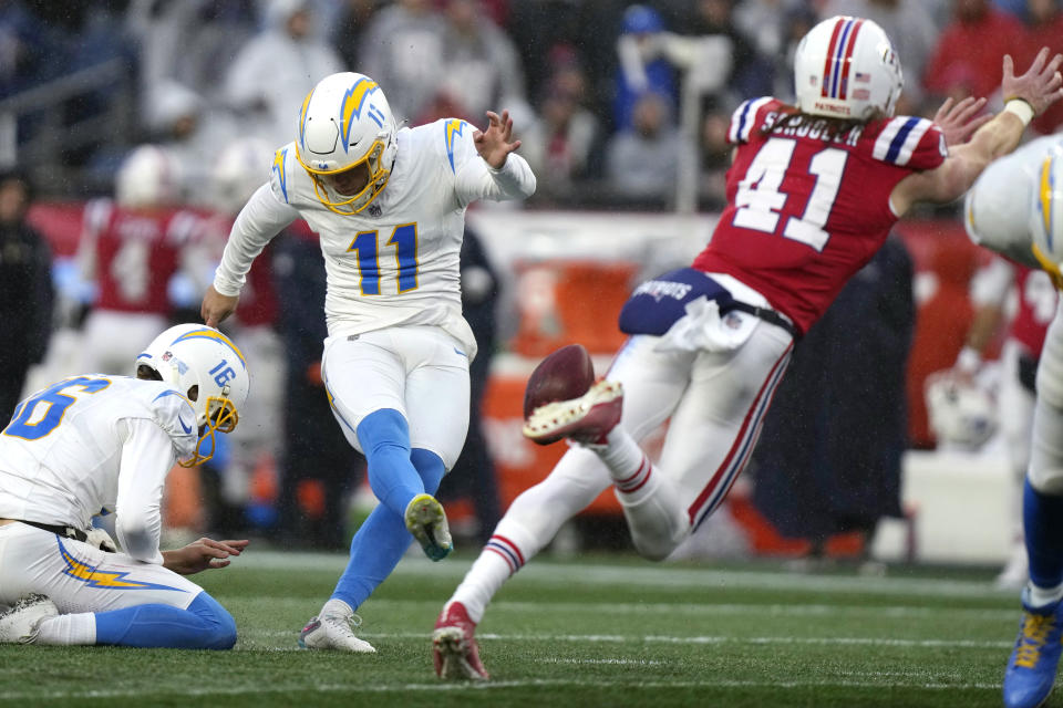 Los Angeles Chargers place kicker Cameron Dicker (11) kicks a field goal during the first half of an NFL football game against the New England Patriots, Sunday, Dec. 3, 2023, in Foxborough, Mass. (AP Photo/Steven Senne)