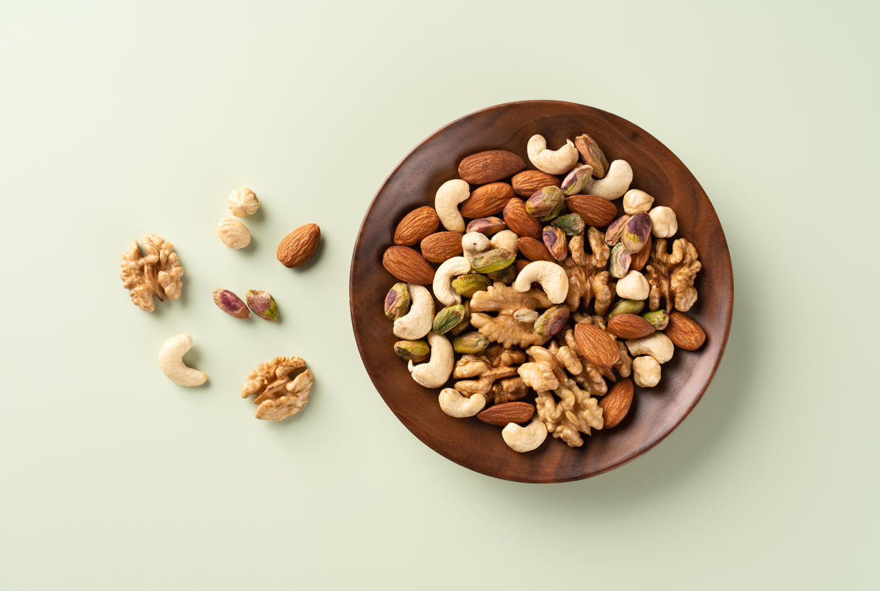 Mixed Nuts Assortment in a Wood Bowl (MirageC / Getty Images)