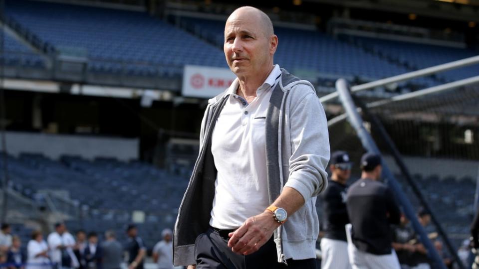 June 20, 2023;  Bronx, New York, USA;  New York Yankees general manager Brian Cashman on the field during batting practice before a game against the Seattle Mariners at Yankee Stadium.