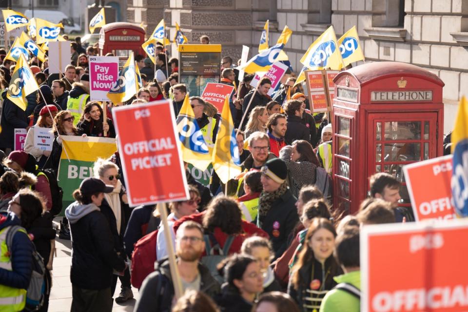 Members of the Public and Commercial Services Union on the picket line in Whitehall, London. Around 100,000 civil servants from 124 government departments, the Border Force, museums and other government agencies are on strike in a dispute over jobs, pay and conditions (PA) (PA Wire)