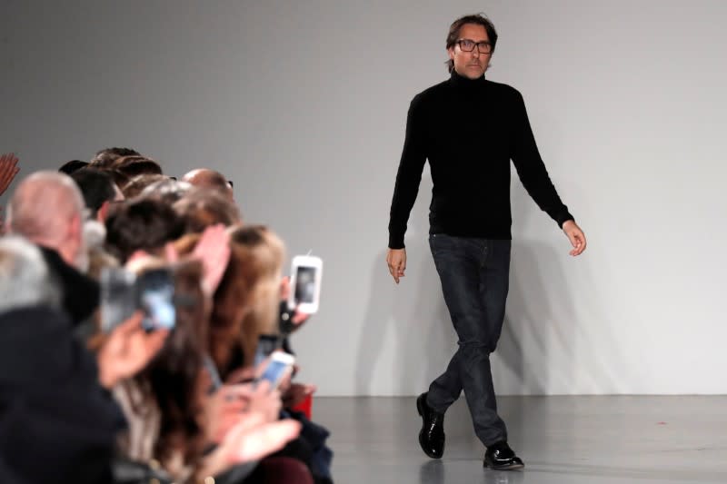 FILE PHOTO: French designer Christophe Josse appears at the end of his Haute Couture Spring-Summer 2018 fashion show in Paris