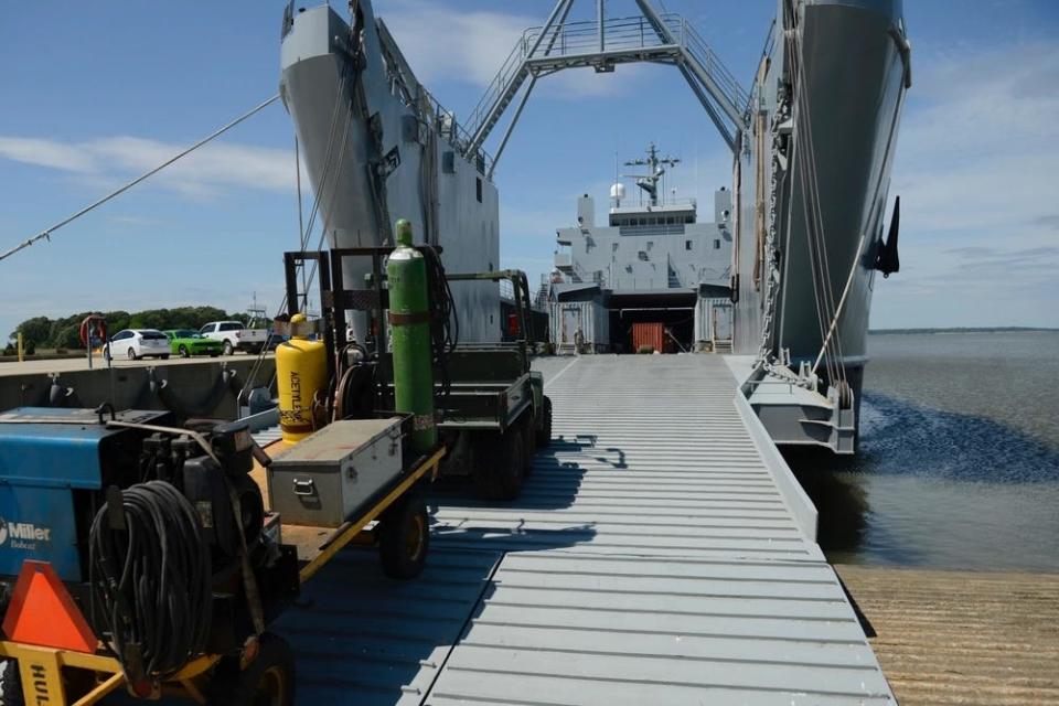 US Army personnel load welding equipment onto the General Frank S. Besson Jr.