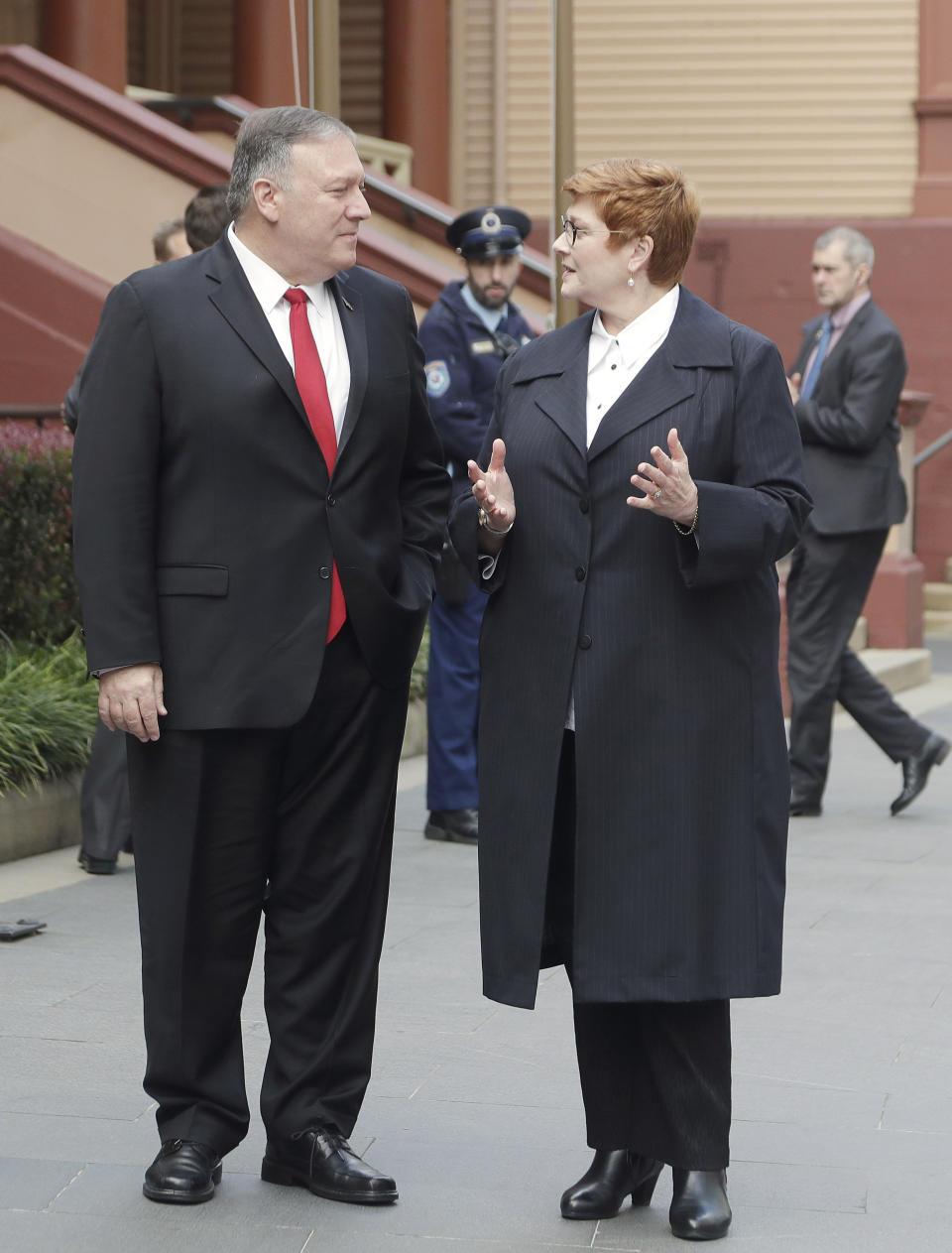 ADDS POOL - U.S. Secretary of State Mike Pompeo, left, and Australian Minister for Foreign Affairs Marise Payne, arrive at New South Wales state parliament in Sydney, Australia, Sunday, Aug. 4, 2019, for annual bilateral talks. (AP Photo/Rick Rycroft, Pool)
