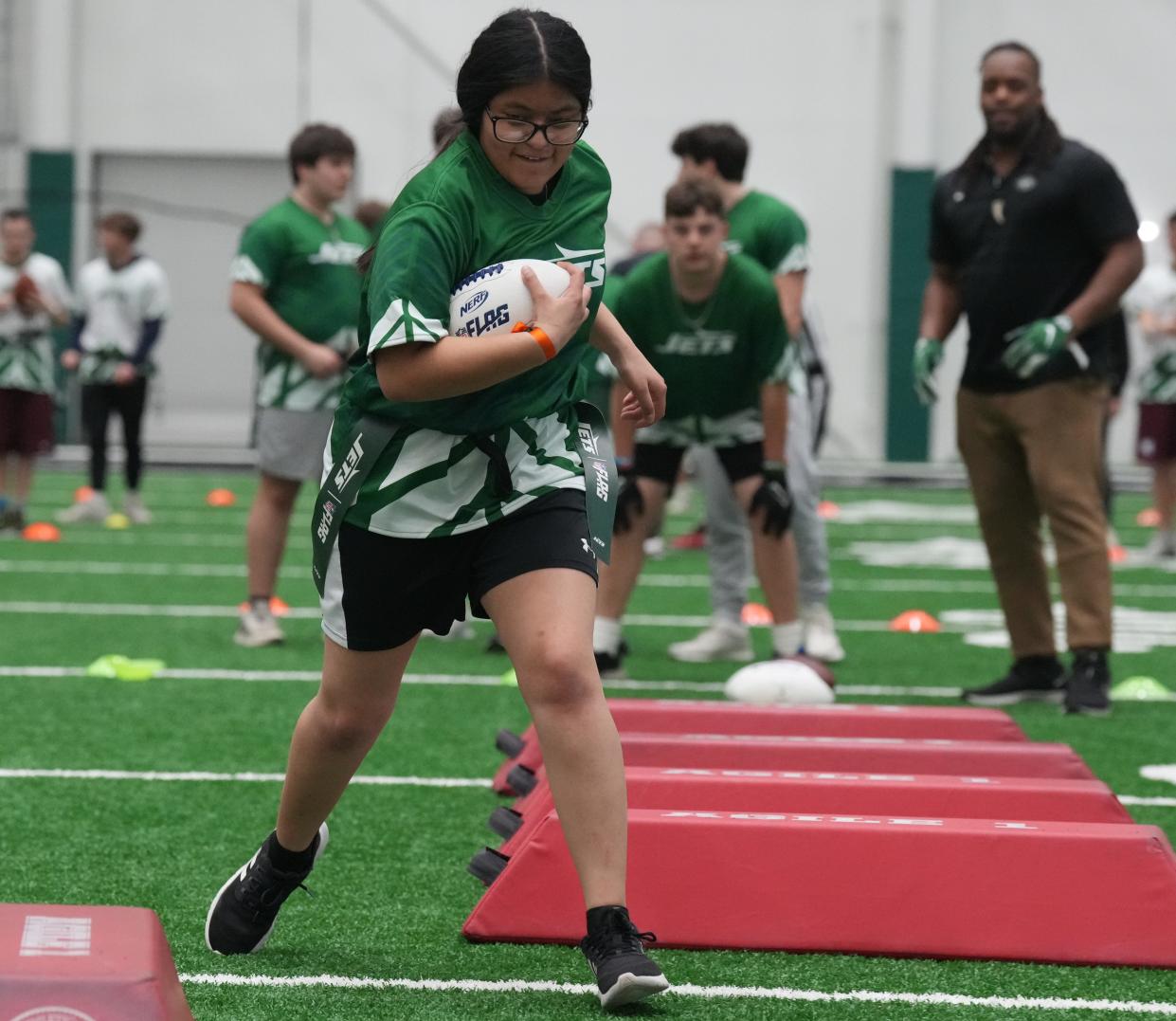 Florham Park, NJ -- April 17, 2024 -- Ashley Martinez of Roxbury at the New York Jets and Special Olympics New Jersey Unified Flag Football clinic.