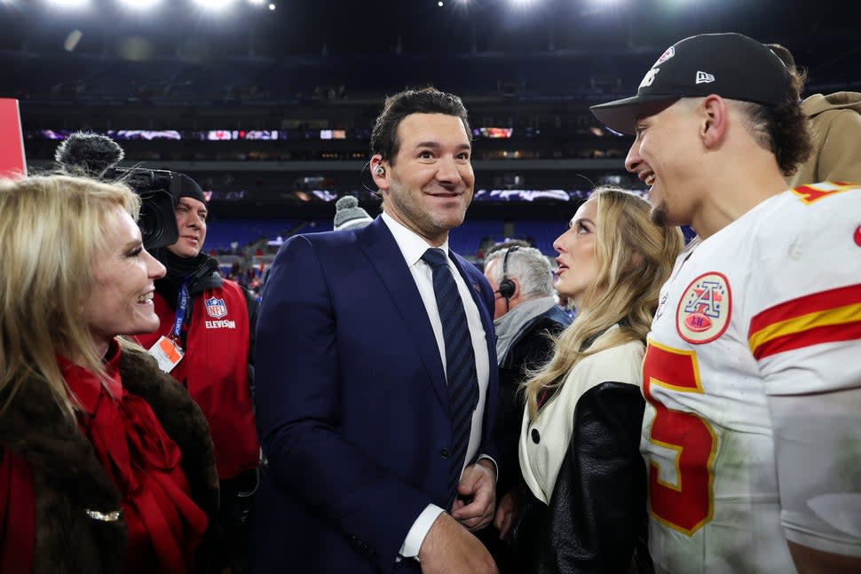  Former NFL quarterback Tony Romo talks with Patrick Mahomes #15 of the Kansas City Chiefs and Brittany Mahomes after the AFC championship game against the Baltimore Ravens at M&T Bank Stadium on January 28, 2024 in Baltimore, Maryland.