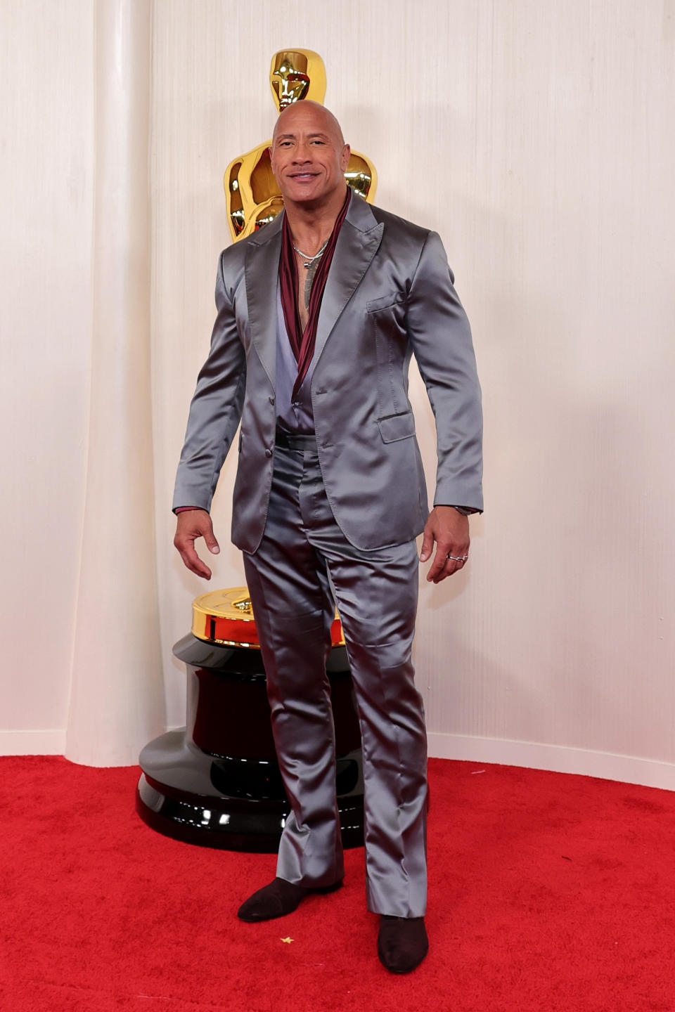 Dwayne Johnson didn't go with a regular tuxedo for the big night, instead rocking a grey outfit. Photo: Getty