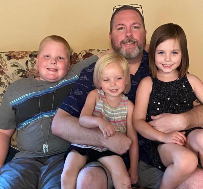 Josh Kilpatrick poses with three of his children — Kholby, Shannley and Abigail Kilpatrick.